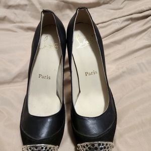Black with silver toe Louboutin